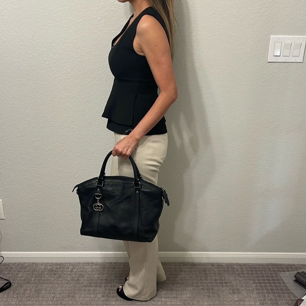 Gucci tote bag. Black leather. Great for a work bag or errands